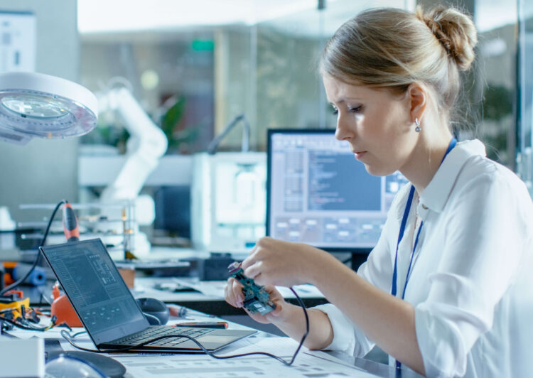 Female Computer Scientists Connects Circuit Board