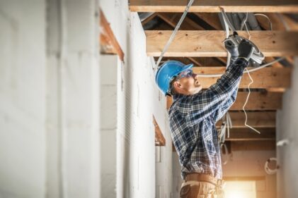 Electrician Working on Electrical Wiring